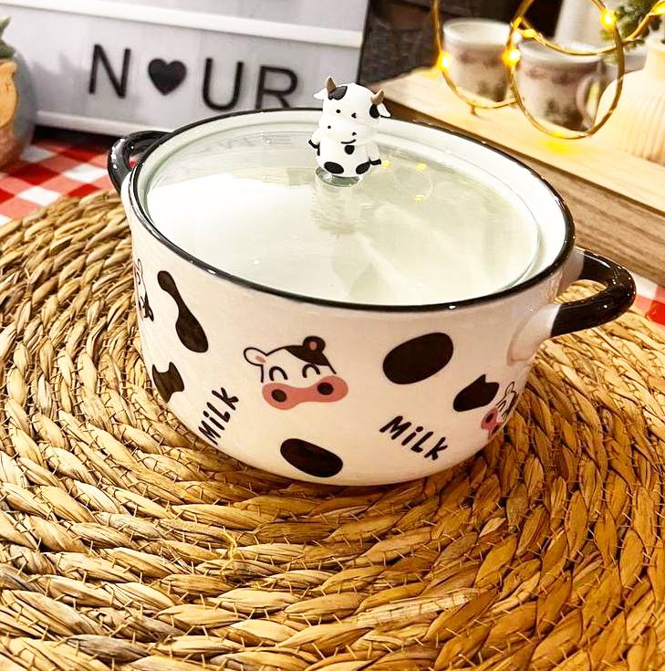 Porcelain cow-shaped pot