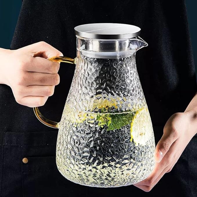 Golden handle glass pitcher